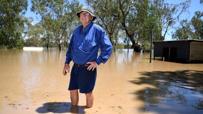 Peter Goodwin in his flooded back yard next to the Balonne river in St George, southwestern Queensland, in February 2020. The Balonne river peaked at 12.2m, causing local flooding. Picture: AAP Image/Dan Peled