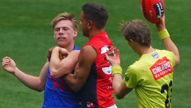 Neville Jetta and Charlie Spargo tangle during the Demons’ intraclub hitout.