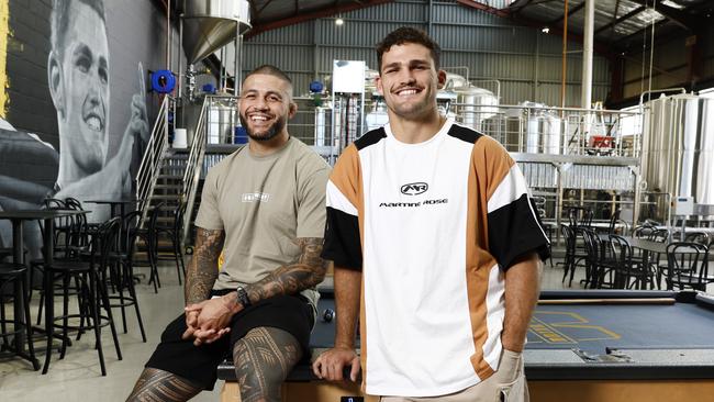 (L-R) UFC fighter turned boxer Tyson Pedro and Penrith Panthers star Nathan Cleary at Drink West Brewery in Penrith. Picture: Richard Dobson