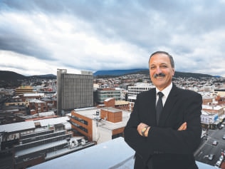 Hobart's Ali Sultan on top of the Commonwealth Bank building in Liverpool St