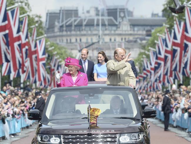 The Queen Prince Philip celebrate the monarch’s 90th birthday on The Mall in 2016. Picture: Getty