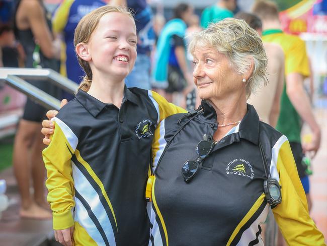 Nightcliff multiclass swimmer Sahrah Hancock and her coach Amanda Bagley at the 2022 Country Swimming Championships, held at the Parap Pool, Darwin Picture: Glenn Campbell