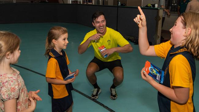 Nick Timmings with the Olympians run training drills with Katherine kids at the YMCA as part of Olympics Unleashed program. Picture: Pema Tamang Pakhrin