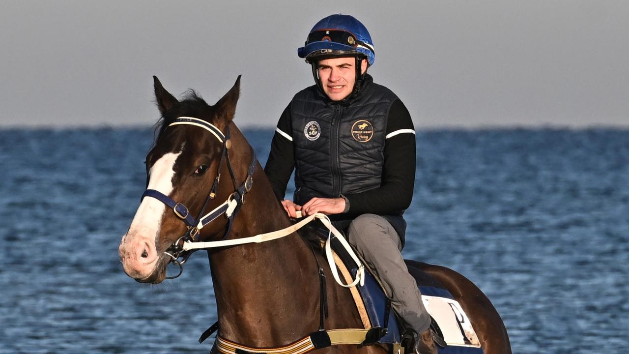 Matthew Chadwick riding I'm Thunderstruck during a trackwork session at Carrum Beach last September. Picture: Vince Caligiuri-Getty Images