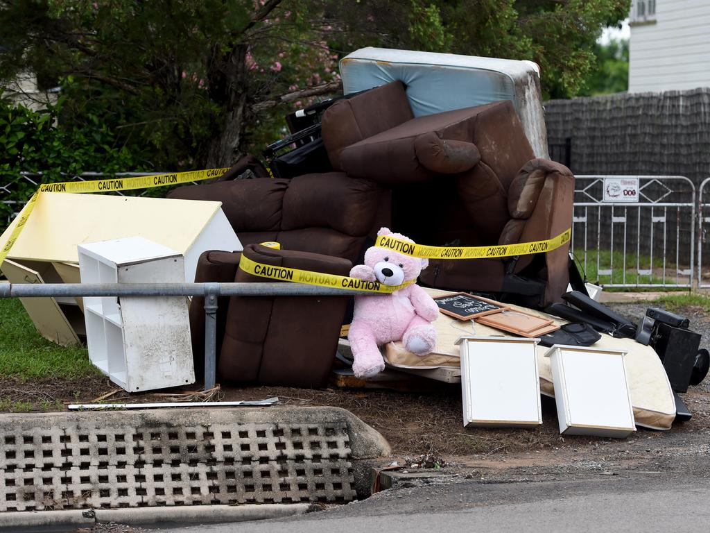 Flood debris piled up in Queens Rd, Hermit Park. Picture: Evan Morgan