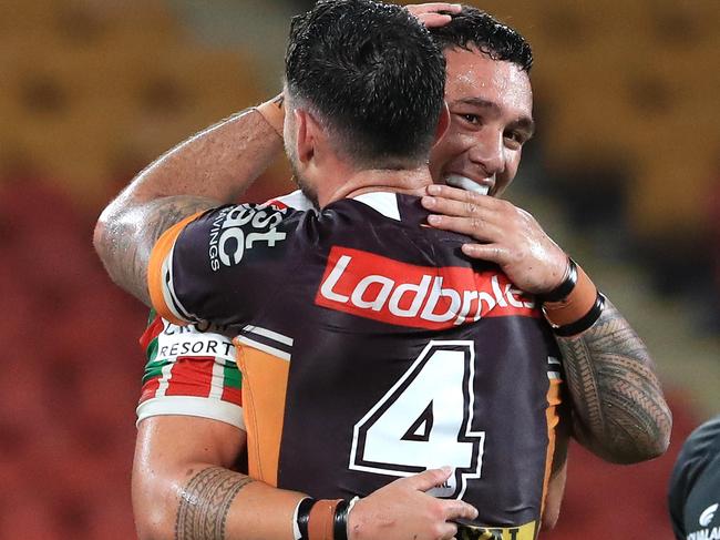 Jaydn Su'a and Darius Boyd come together after the Round 2 NRL game between the Brisbane Broncos and the South Sydney Rabbitohs at Suncorp Stadium, Brisbane. Pics Adam Head