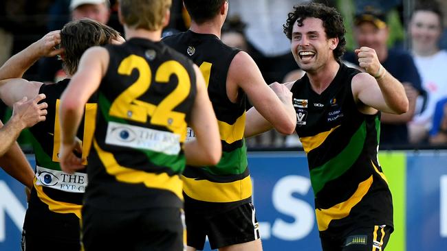 Ethan Johnstone of the Tigers is congratulated by team mates after kicking a goal during the 2023 MPFNL Division One Seniors Grand Final match between Dromana and Frankston YCW at Frankston Park in Frankston, Victoria on September 17, 2023. (Photo by Josh Chadwick)