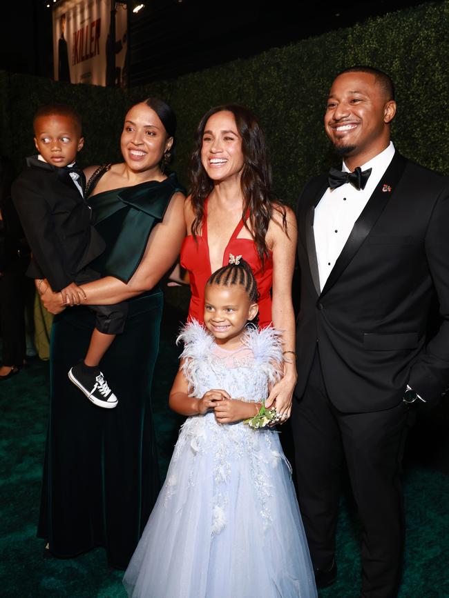 (L-R) Francis Nelson, Ella Nelson, Meghan Markle and guests. Picture: Getty Images for Children's Hospital Los Angeles