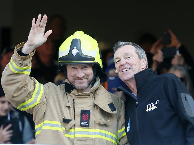 Buckley and Daniher before Buckley went down the slide. Picture: Michael Klein