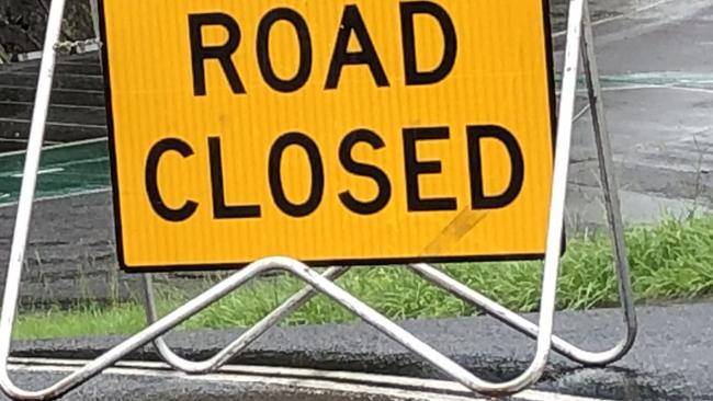 The Old Byron Bay Road is being cleared of a hydraulic fluid spill at Newrybar on Monday March 22, 2021. File Photo: Alison Paterson