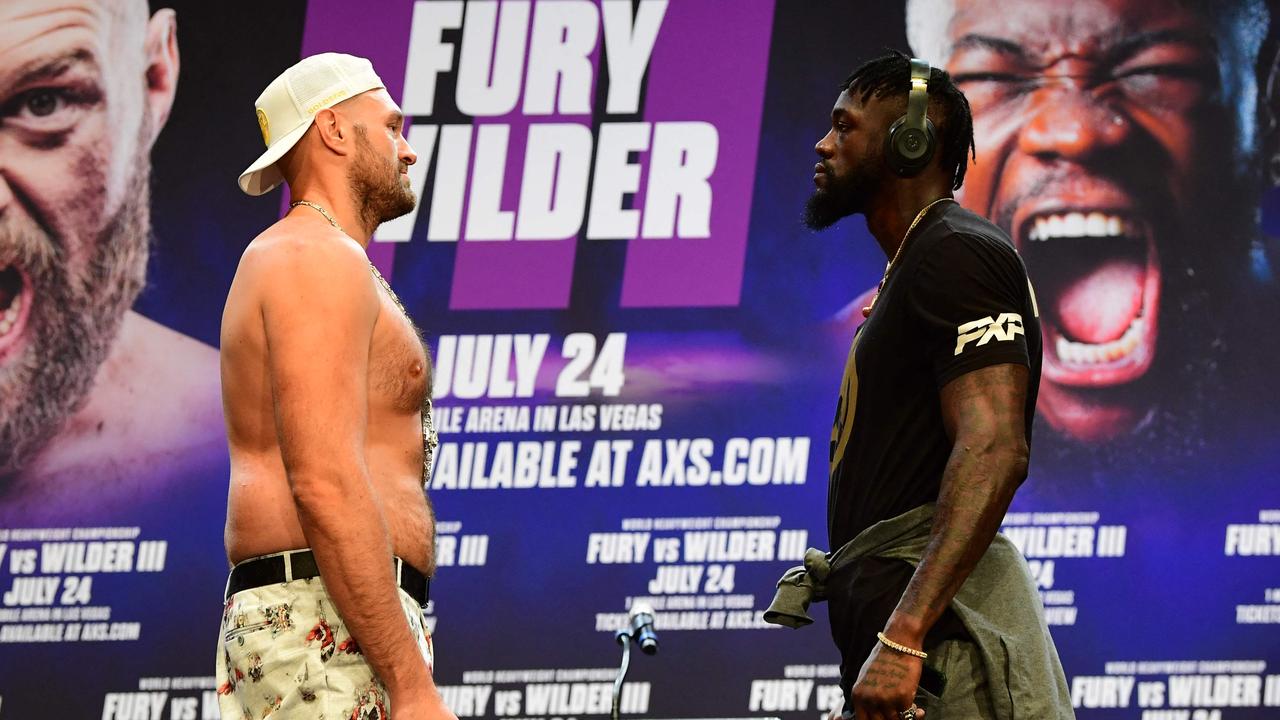 Neither of them said a word. (Photo by FREDERIC J. BROWN/AFP).