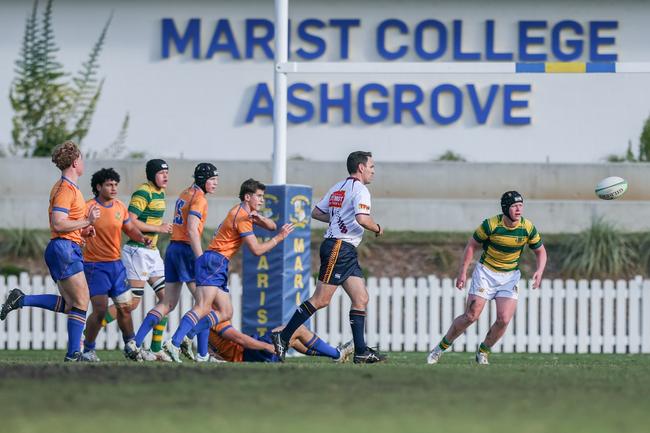 Harry Graham gets the ball away. Picture by Stephen Archer.