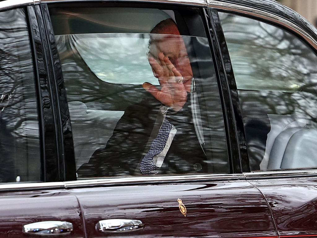 King Charles smiled as he was driven to Buckingham Palace from Clarence House. Picture: AFP