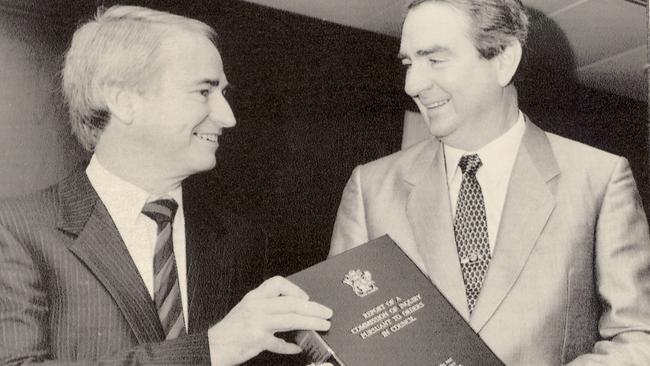 Tony Fitzgerald QC with premier Mike Ahern handing down the report of the Commission of Inquiry. file pic jul 1989 headshot