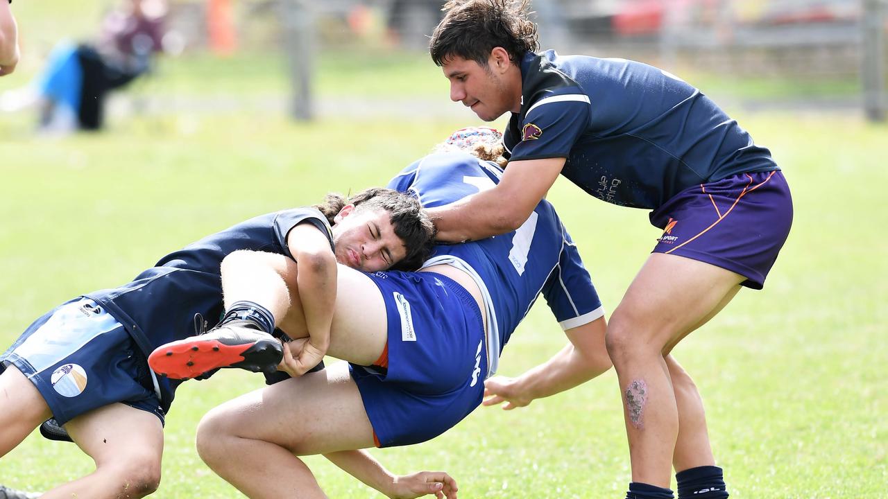 RUGBY LEAGUE: Justin Hodges and Chris Flannery 9s Gala Day. Grand final, Caloundra State High School V Redcliffe State High, year 12. Caloundra's Kayden Humphreys' tackles a Redcliffe player. Picture: Patrick Woods.