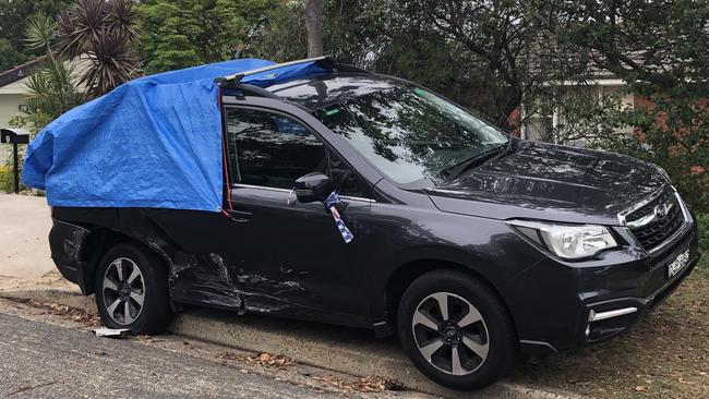 The damaged Subaru Forester, in Kendal Cres, Wheeler Heights. Picture: Jim O'Rourke