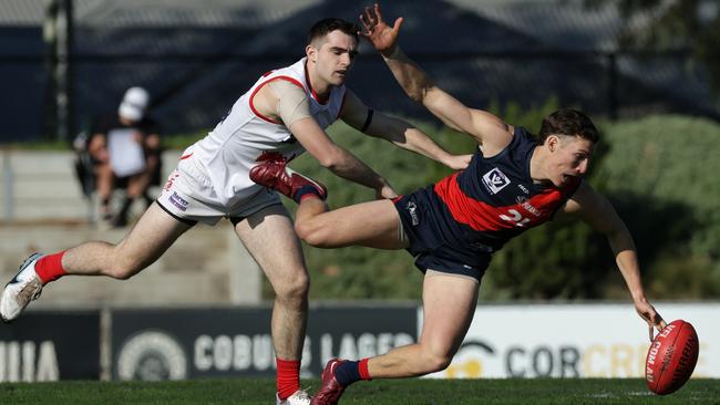 VFL Coburg’s Ben Jepson cops a shove. Picture: Hamish Blair