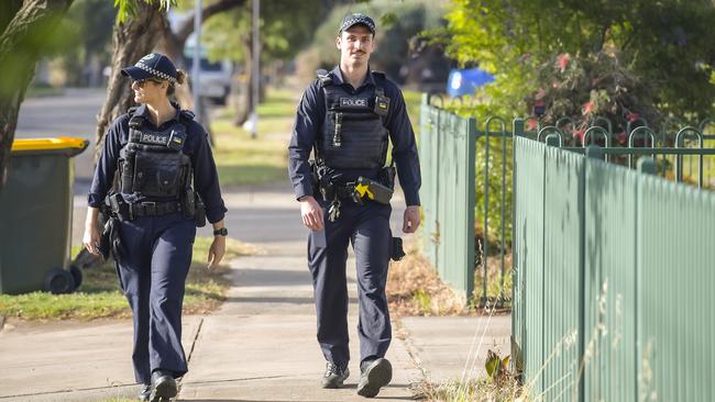 Police officers doorknocking Nelson St. Picture: Roy VanDerVegt