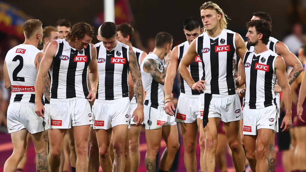 The Magpies leave the field after losing to Brisbane at the Gabba. Picture: Chris Hyde/AFL Photos/via Getty Images