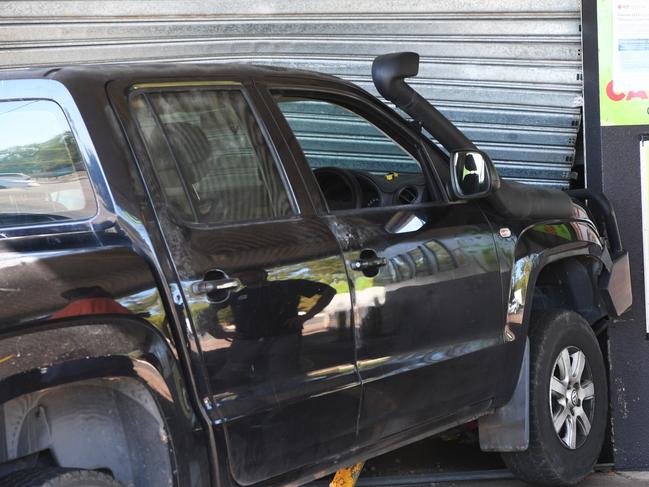 A Volkswagen Amarok was ram-raided into the Howard Springs Thirsty Camel on Monday morning, lodging itself on a bollard.  Picture Katrina Bridgeford.