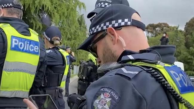 The woman filming was arguing with police outside the Melbourne Cup. Pictures: Facebook