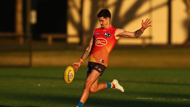 Alex Sexton prepares for his 150th game for the Gold Coast Suns. Picture: Chris Hyde/Getty Images