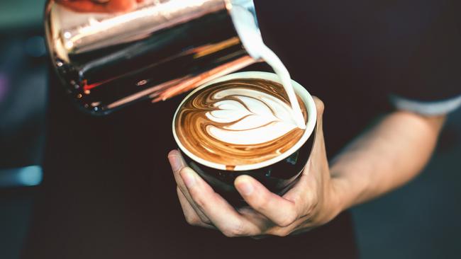 A barista making a coffee in cafe,Photo -  istockEscape 10 July 2022doc holiday