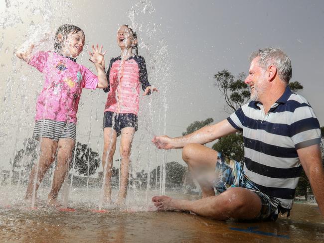 HOLD FOR HERALD SUN PIC DESK----East Gippsland tourism in fire affected areas, in attempts to draw the crowds back to seaside locations and small country towns. Metung. Patrick Carson and his daughters Arabella, 6, left, and Jemima, 9, right.  Picture: Alex Coppel.