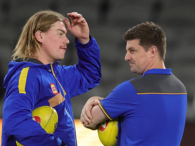 MELBOURNE, AUSTRALIA - APRIL 27: Harley Reid and Andrew McQualter, Senior Coach of the Eagles during the 2025 AFL Round 07 match between the Hawthorn Hawks and the West Coast Eagles at Marvel Stadium on April 27, 2025 in Melbourne, Australia. (Photo by James Wiltshire/AFL Photos via Getty Images)