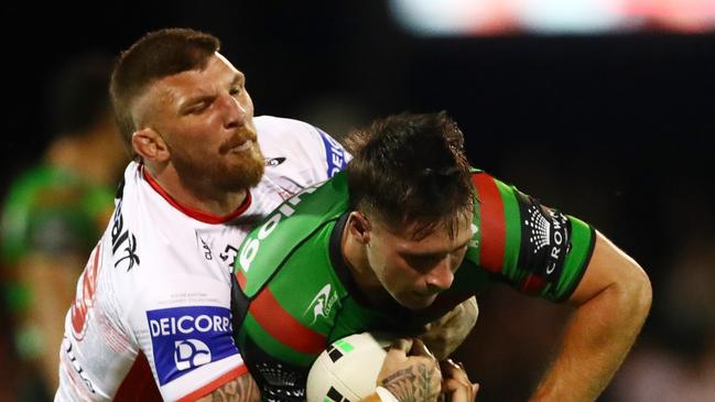 Lachlan Ilias is tackled by Josh McGuire during the Charity Shield match. Picture: Getty