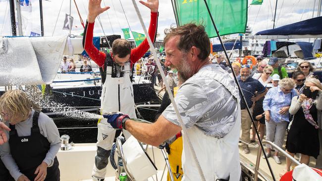 Take Five, skippered by Ian Gannon, celebrating on their arrival into Hobart last year.