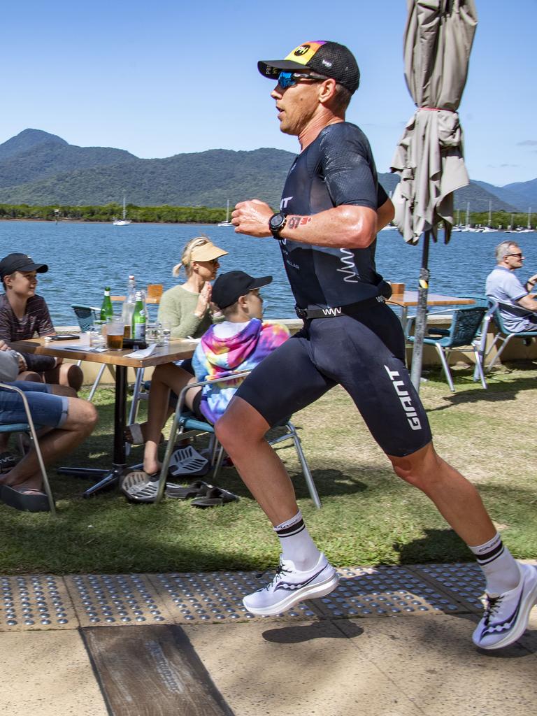 Cairns Iron Man - Sam Appleton on the water front during the run leg. Picture: Brian Cassey