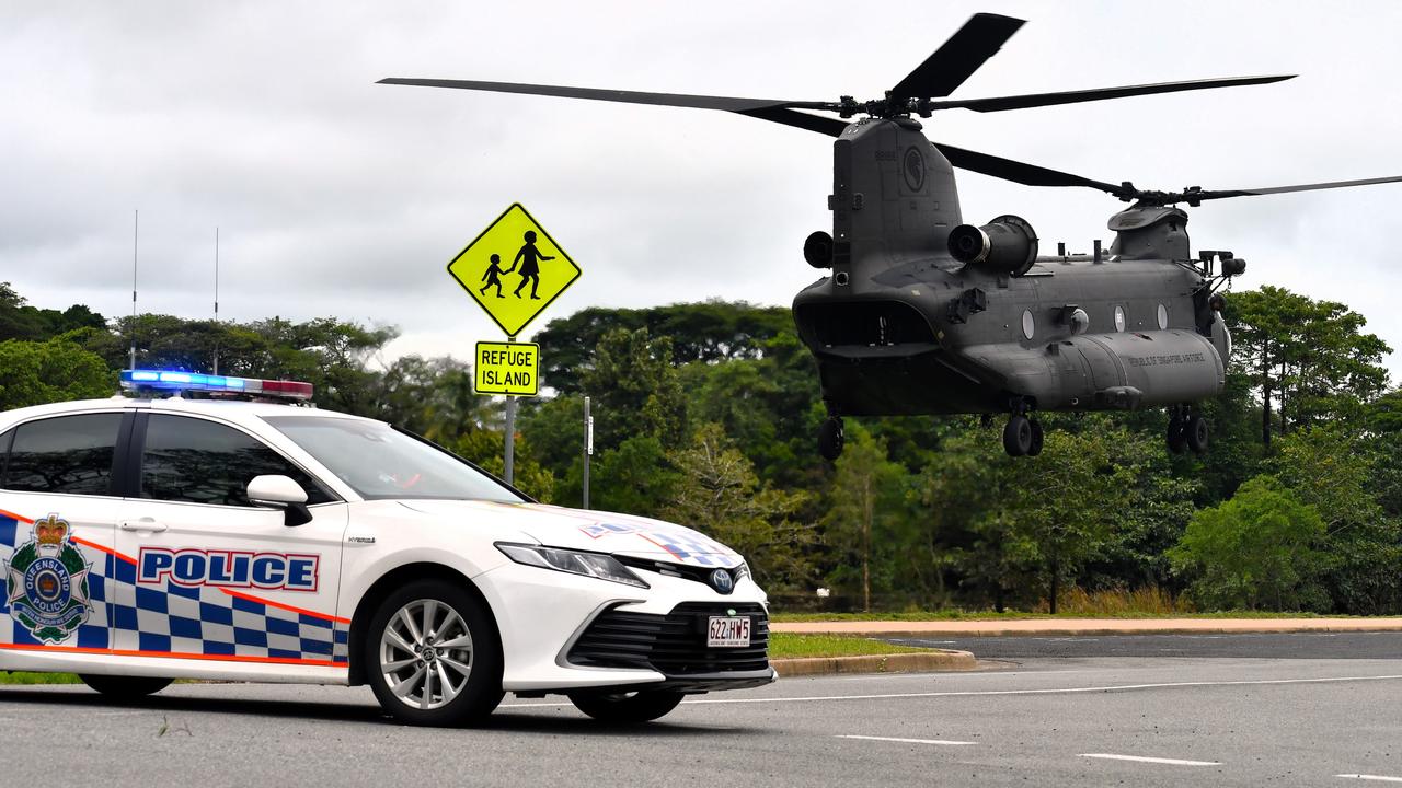 A Singapore Air Force CH-47F Chinook Helicopter landing outside Ingham State High School on Sunday. The floods in Hinchinbrook Shire, North Queensland. Picture: Cameron Bates