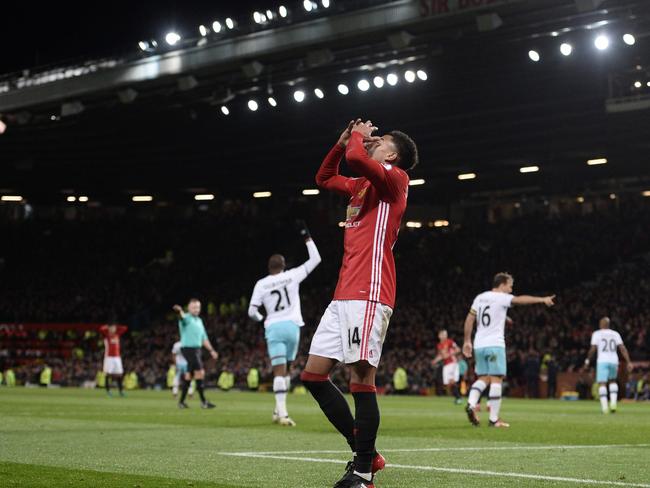 Manchester United's English midfielder Jesse Lingard (C) reacts after a goal was ruled offside.