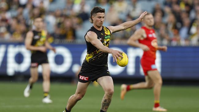 MELBOURNE, AUSTRALIA – AUGUST 24: Liam Baker kick a goal during the round 24 AFL match between Richmond Tigers and Gold Coast Suns at Melbourne Cricket Ground, on August 24, 2024, in Melbourne, Australia. (Photo by Darrian Traynor/Getty Images)