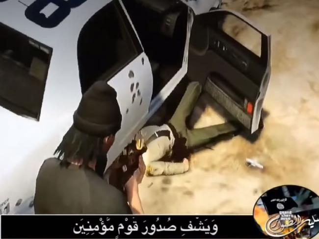 Execution ... Pulling police from their cars and shooting them while on the ground is one of the clips contained in the Islamic State promotional video.