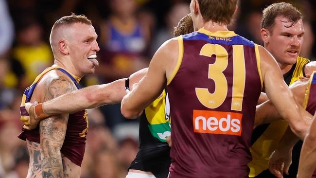 BRISBANE, AUSTRALIA - OCTOBER 02: Mitch Robinson of the Lions (left) is seen during the 2020 AFL Second Qualifying Final match between the Brisbane Lions and the Richmond Tigers at The Gabba on October 02, 2020 in Brisbane, Australia. (Photo by Michael Willson/AFL Photos via Getty Images)
