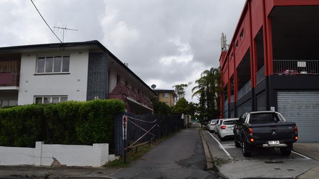City North News Shelley Threlfall says that a paved area next to her block of units at 15 East St, Lutwyche, is a pathway, not a road. But council says it’s a public road. Picture: Amanda Horswill