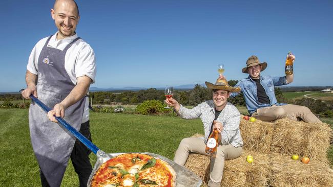 Francesco Laera from Trulli Woodfired Pizza joins Tom and James Gurnett from Gurneys Cider for a joint Cider and Pizza package. Picture: Tim Carrafa