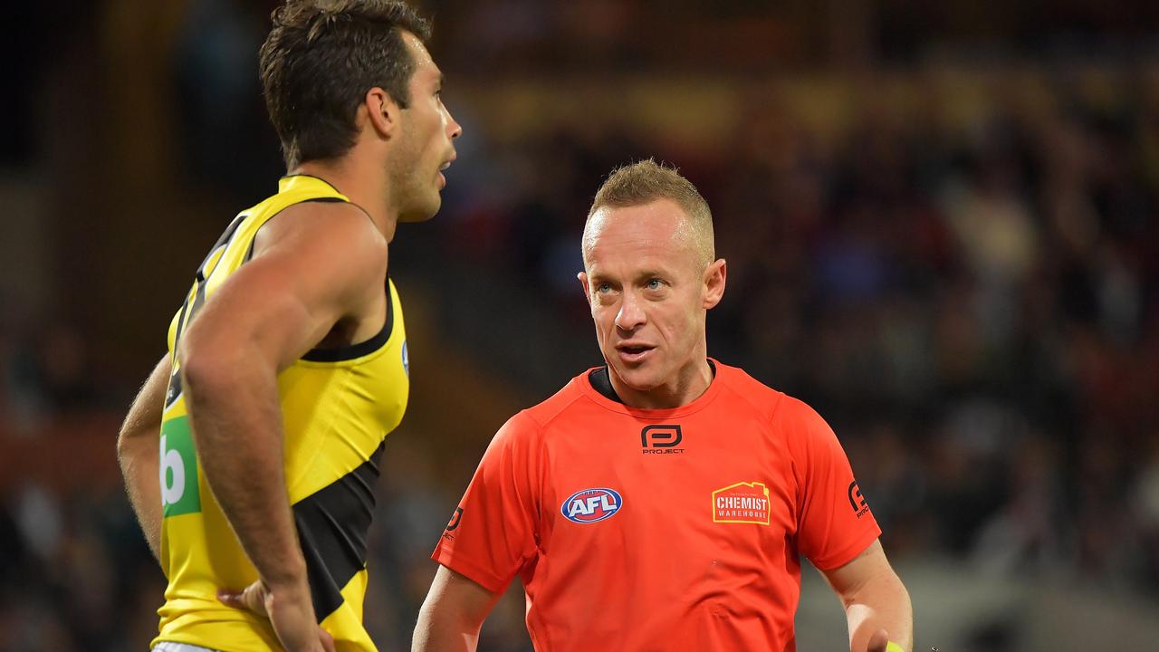 Umpire ‘Razor’ Ray Chamberlain and Alex Rance. Photo: Daniel Kalisz/Getty Images