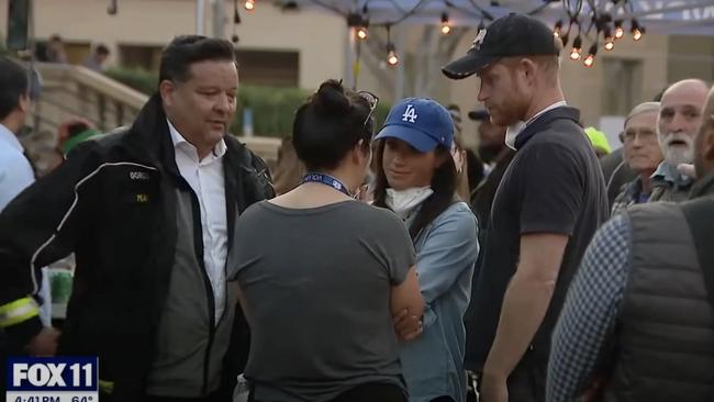 Prince Harry and Meghan Markle visited victims of the Eaton Fire in LA. Picture: FOX 11 Los Angeles