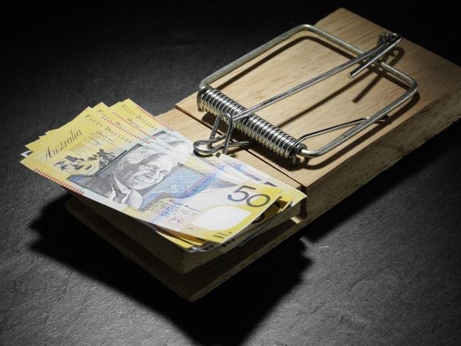 Australian dollars in a mouse trap, generic notes, cash.