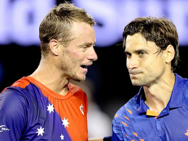 Lleyton Hewitt chats with David Ferrer after the match.
