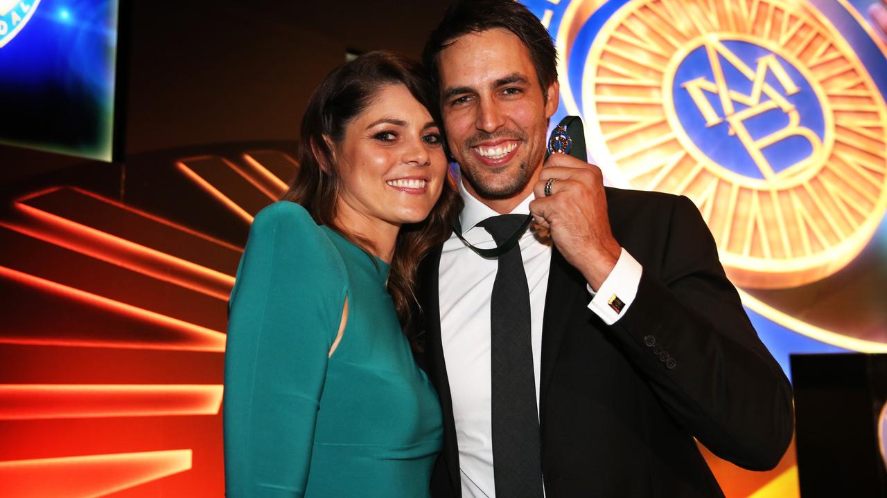 Australia's Mitchell Johnson with his wife Jessica Bratich-Johnson after winning the 2014 Allan Border Medal. Photo Phil Hillyard.