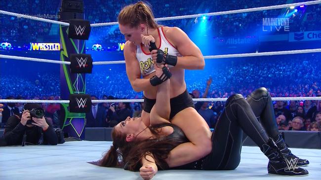 Ronda Rousey wins in WWE debut.