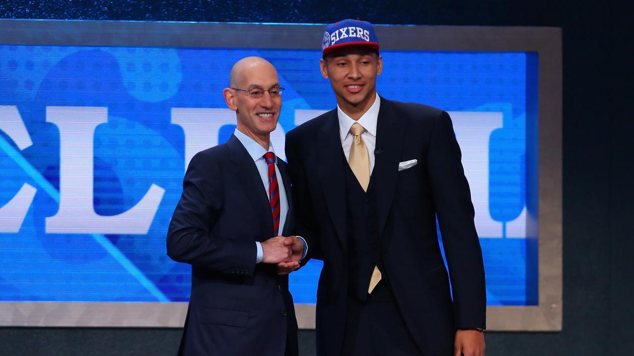 Ben Simmons poses with Commissioner Adam Silver after being drafted first overall by the Philadelphia 76ers. (Photo by Mike Stobe/Getty Images)