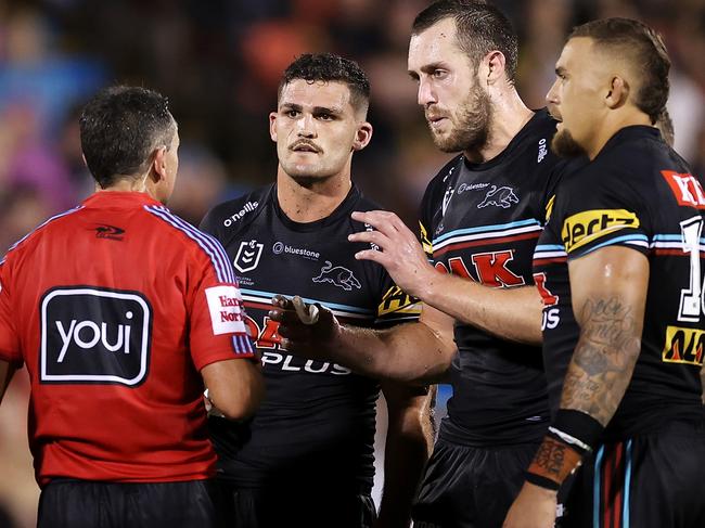 PENRITH, AUSTRALIA - MARCH 03: Nathan Cleary and Isaah Yeo of the Panthers speak to referee Gerard Sutton during the round NRL match between the Penrith Panthers and the Brisbane Broncos at BlueBet Stadium on March 03, 2023 in Penrith, Australia. (Photo by Mark Kolbe/Getty Images)