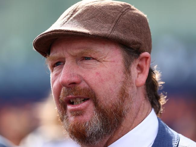 SYDNEY, AUSTRALIA - FEBRUARY 17: Trainer Gary Portelli celebrates after Jason Collett riding Kimochi wins Race 8 TAB Light Fingers Stakes during "Apollo Stakes Day" - Sydney Racing at Royal Randwick Racecourse on February 17, 2024 in Sydney, Australia. (Photo by Jeremy Ng/Getty Images)