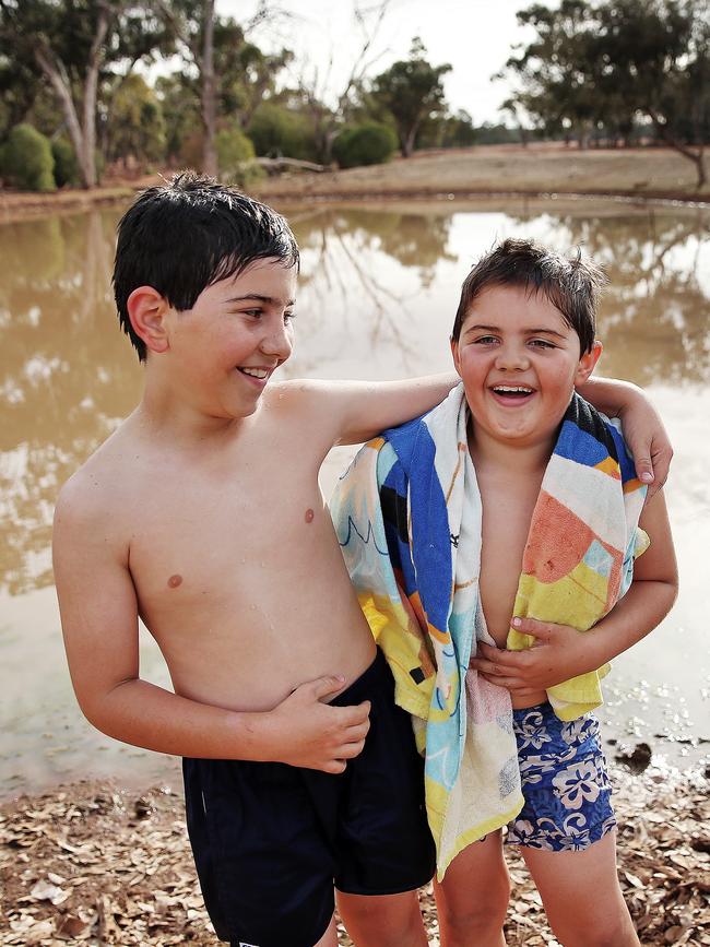 The boys are forced to bathe in the dam water. Picture: Sam Ruttyn