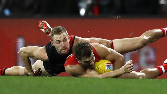 Smith laying a strong tackle on Sydney’s Tom Papley last week. Picture: Getty Images